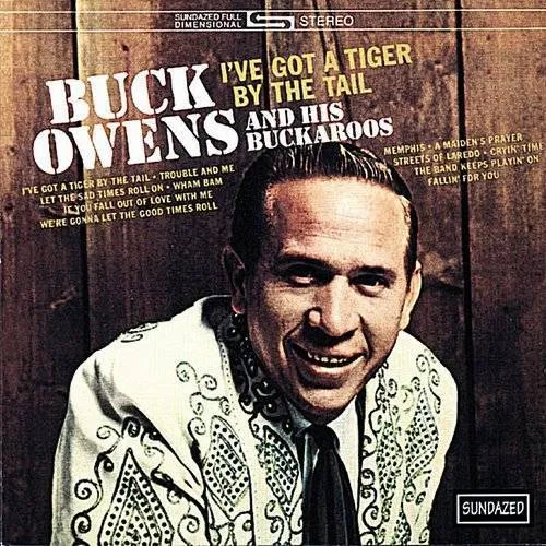 Buck Owens - I've Got A Tiger By The Tail
